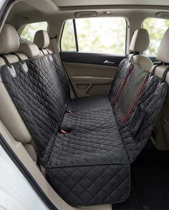 RoadHound hard-bottom dog car seat protector installed in SUV back seat