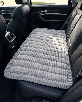RoadHound Luxe Bed cushion laid across SUV back seat